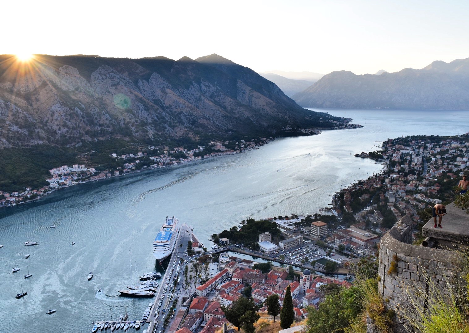 Looking at mountains, lake and old town of Kotor from the Kotor Fortress at Sunset