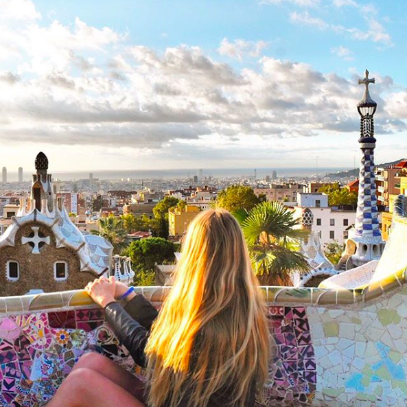 Girl looking out over the view of Park Guell