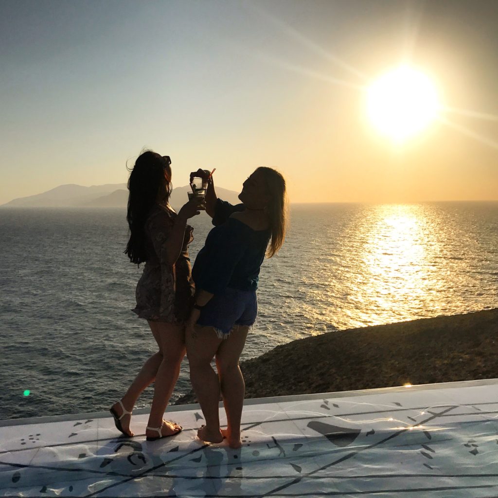 Pathos Sunset Lounge cheers girls drinks Ios Greece