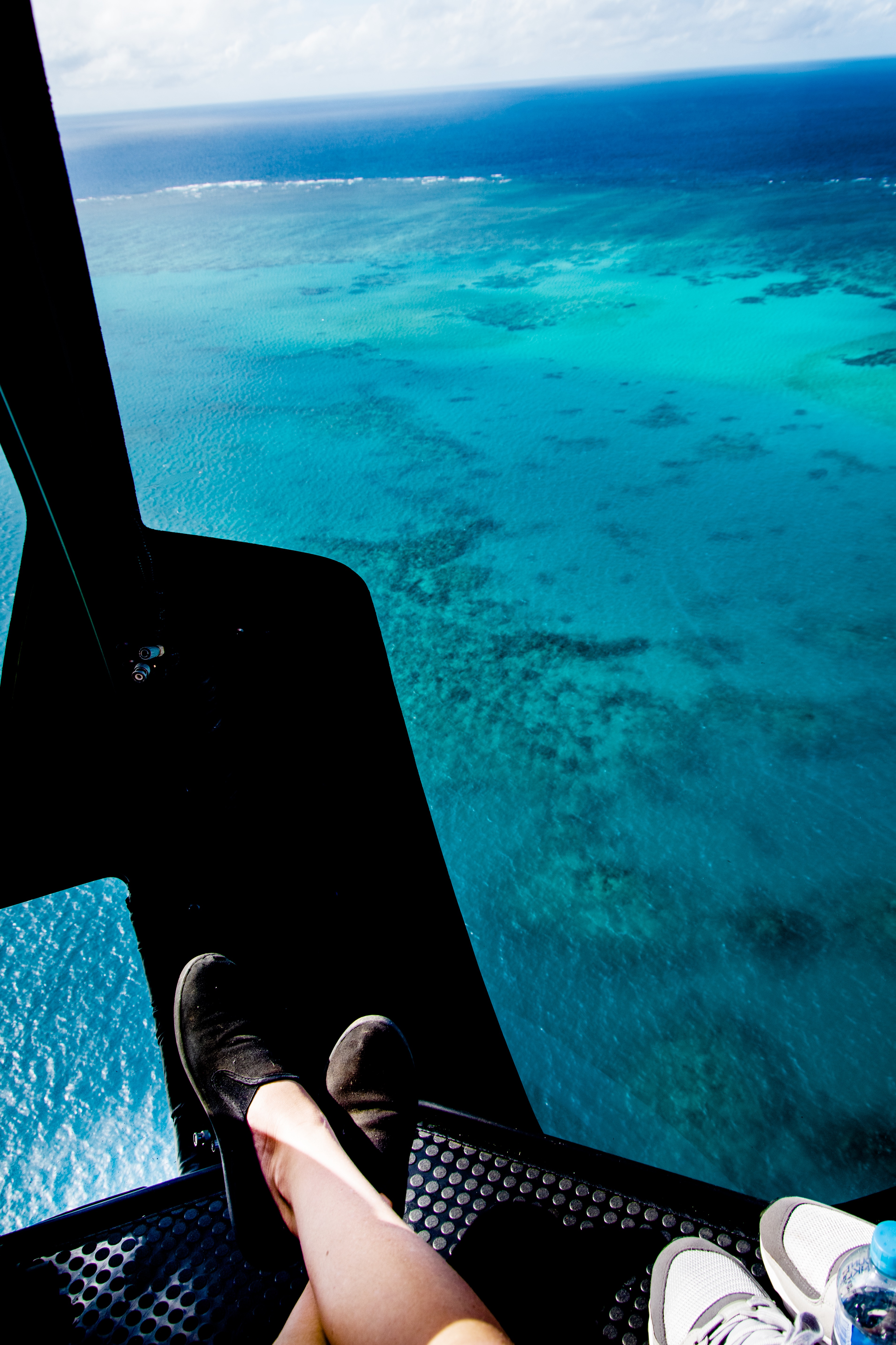 feet in helicopter above the great barrier reef
