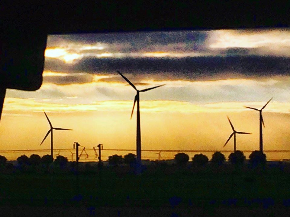 Europe on a budget - sunset from bus between Amsterdam and Paris